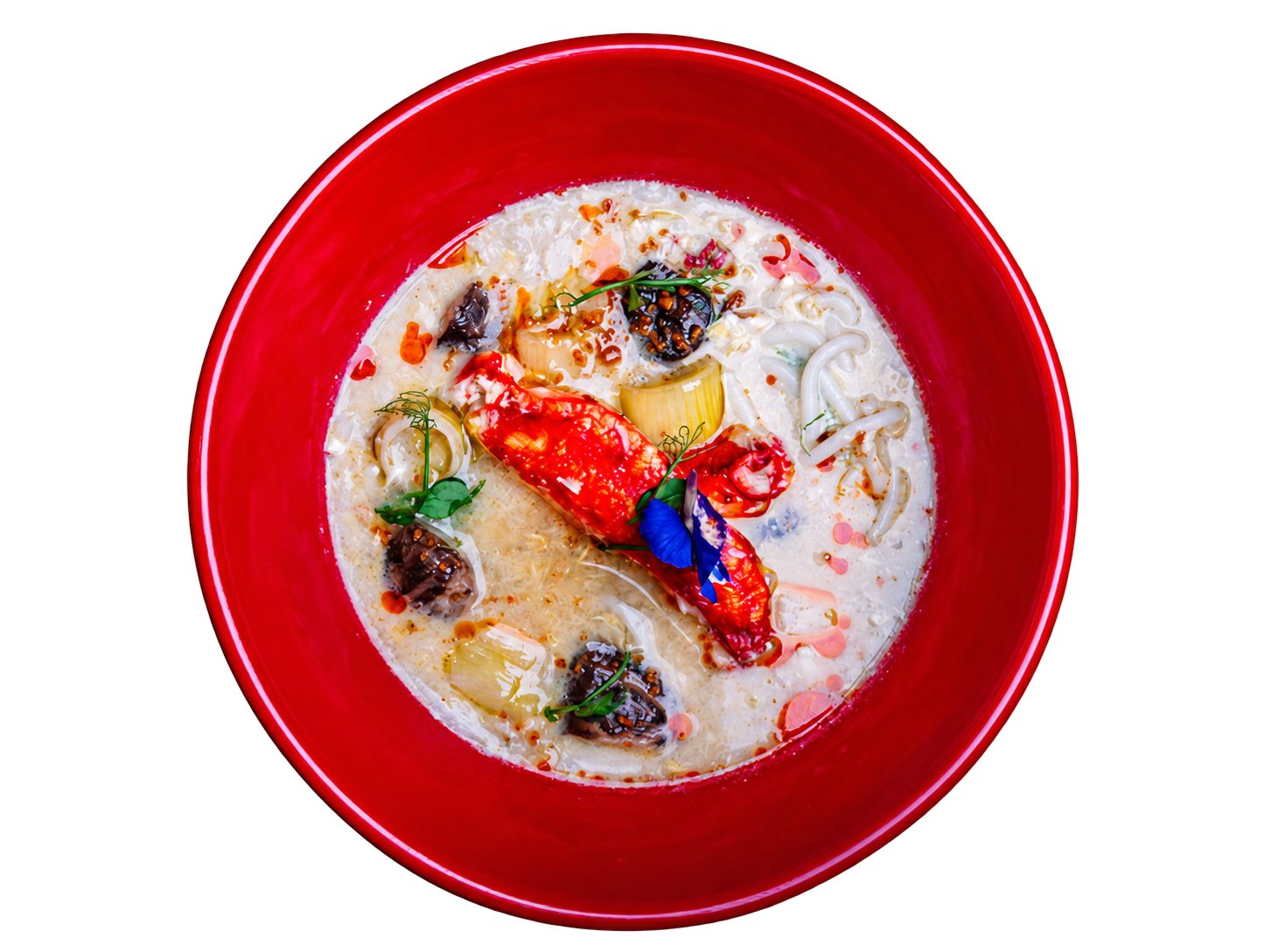 King Crab Mixian in a bright red bowl, with rice noodles, broth, crab, and garnishes