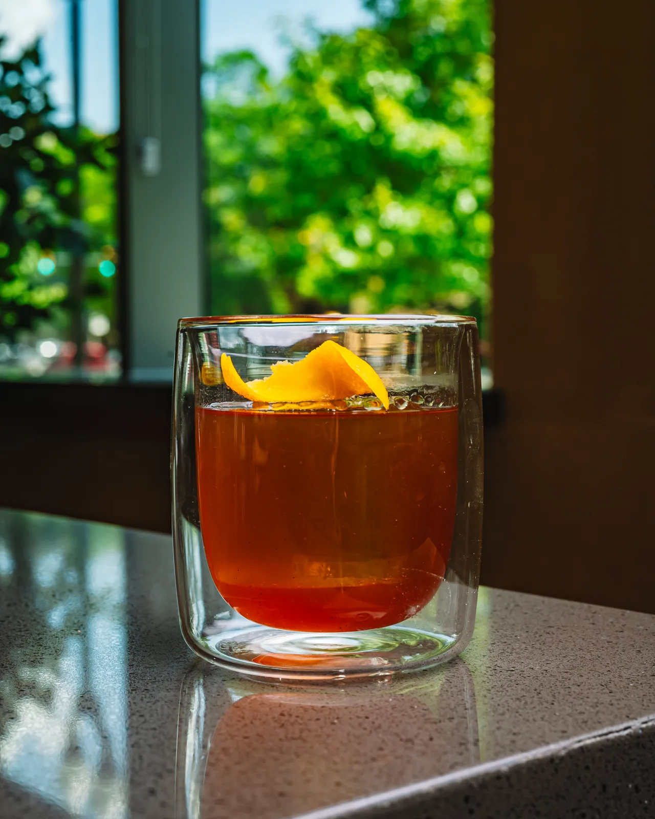 Amber cocktail with a citrus twist