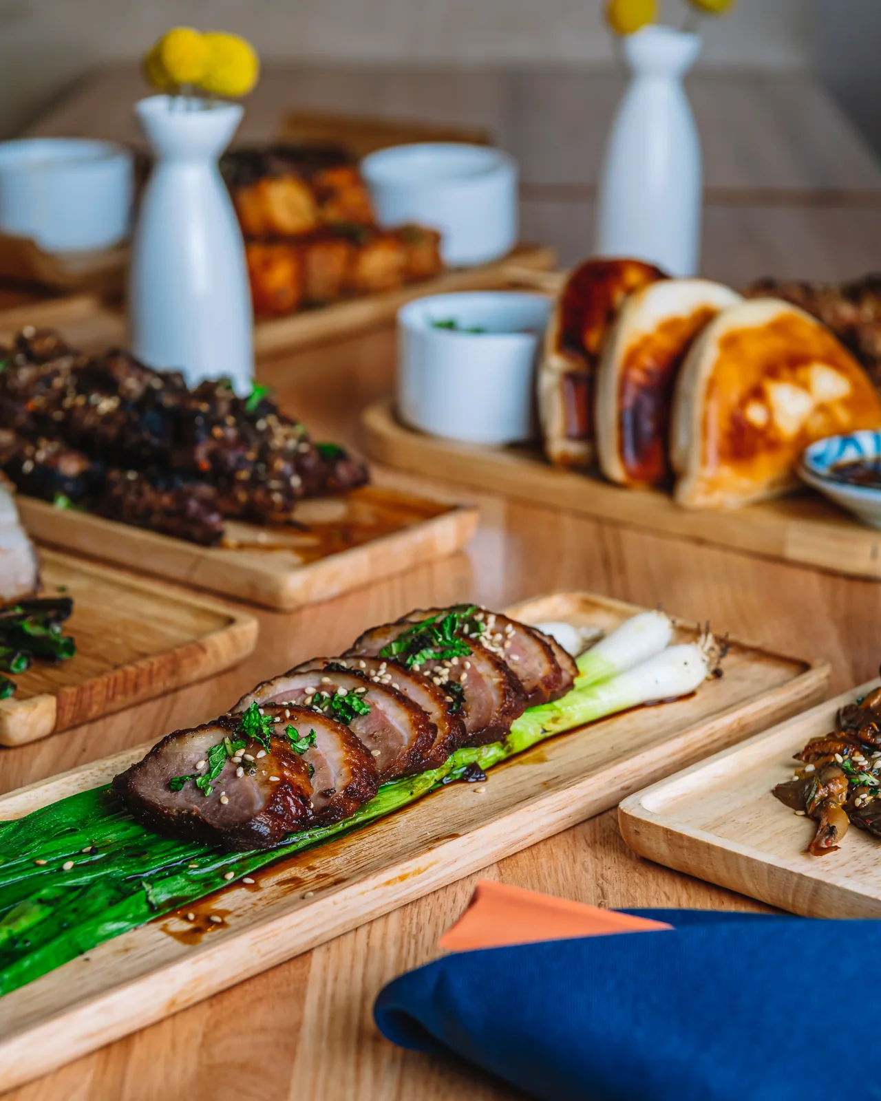 Grilled skewers served on a wooden board